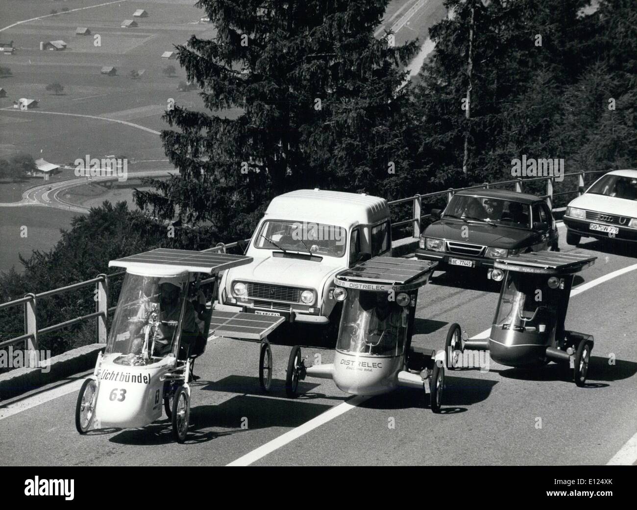 Jun. 30, 1986 - With solar energy in the Swiss mountains: Solar mobils take the upgrade together with ordinary cars on the Brunig-pass street that links famous holiday region of Brienz/Interlaken with Lucerne. Foto taken during the ''Tour de Sol'' solar mobil race through Switzerland last Friday 27th. the Tour ended in Suhr (Canton of Aargau) on Saturday. Stock Photo
