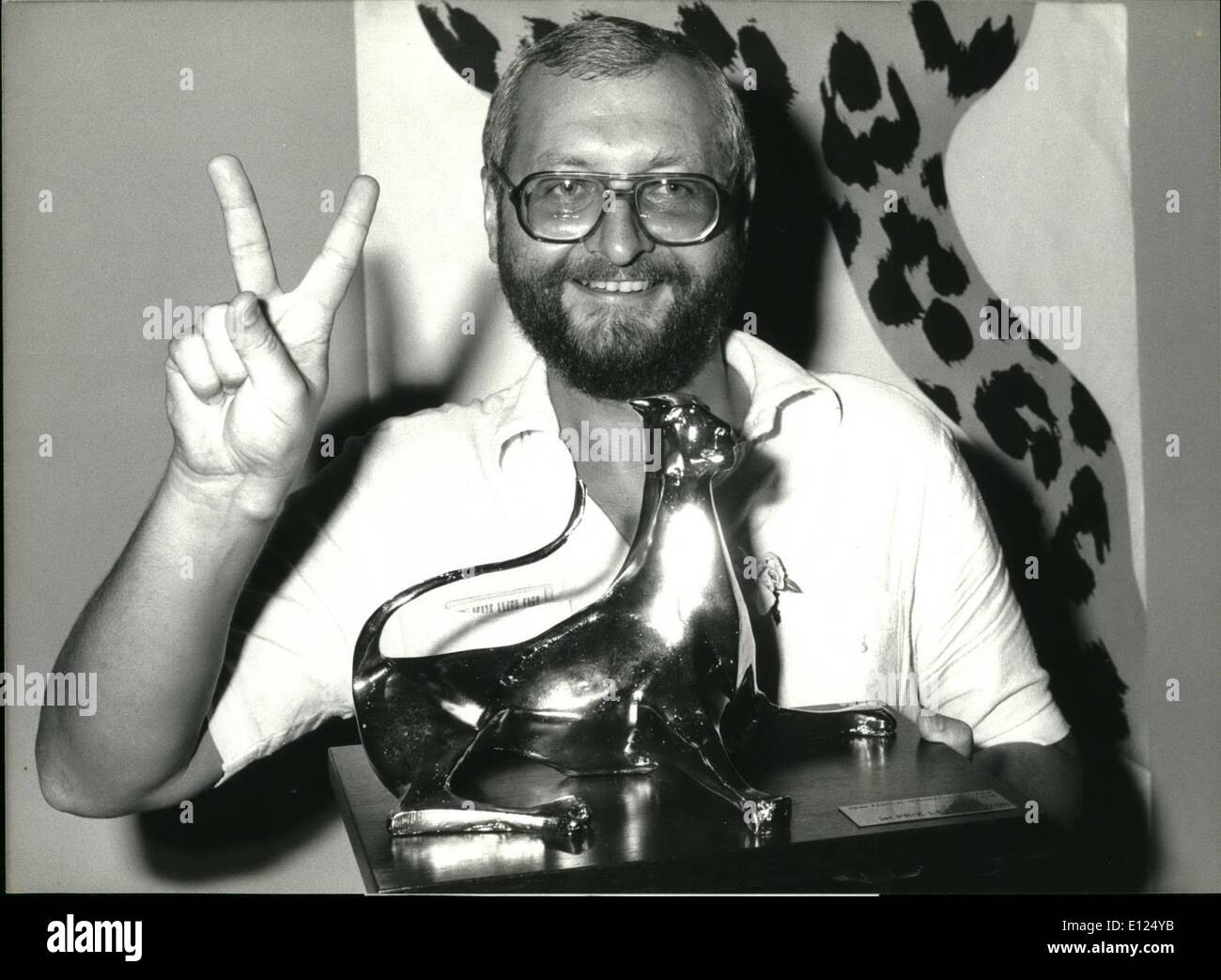 Aug. 08, 1986 - Polish Winner At Locarno Film-Festival: Polish Film-Director Janusz Zaorski was rewarded by the 39th Locarno-Filmfestival Jury with the most famous ''Golden Leopard''. Zaorski smiles, as he receives the price for his movie ''Jezioro Bodenskie'',-which simply means ''Lake of Canstance'' or ''Bodensee' Stock Photo