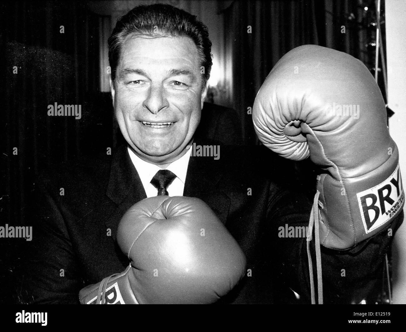 Dec. 18, 1986 - Zurich, Switzerland - JEAN-PASCAL DELAMURAZ poses with boxing gloves. Delamuraz was a Swiss politician and member of the Swiss Federal Council. Stock Photo