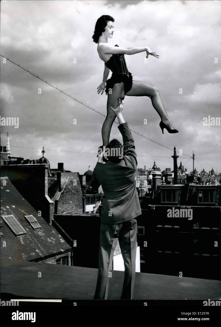 Mar. 03, 1987 - Another attractive statue is added to the London skyline as pretty Marian Morris is lifted aloft by one of her partners. She looks as if she is about to step onto Nelson's Column. Stock Photo