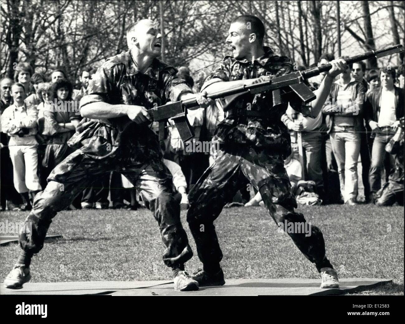 Apr. 04, 1987 - ''Rambo'' in the Swiss-armee Like the well known US-GI's look this two Swiss soldiers during a public-day in Isone in the south of Switzerland. Stock Photo