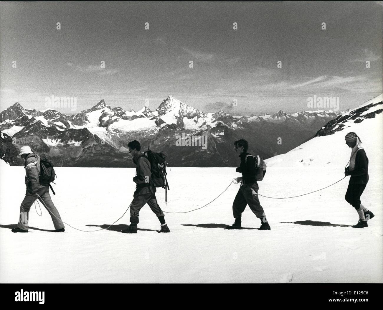 Jul. 07, 1992 - Mountaineering In Ice And Snow: Summer is high season for hiking tours high up in the alps of Switzerland: A roped party en route down from the peak of ''Breithorn'' (Wallis, southern Switzerland) Stock Photo