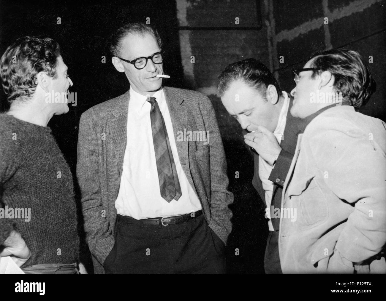 Feb 11, 2005; London, UK; (FILE PHOTO) 'The Crucible' and 'Death of a Salesman' Pulitzer Prize winning author ARTHUR MILLER died Feb 10th, 2005 at his Roxbury, Connecticut home of congenital heart failure. The ex-husband of Marilyn Monroe had cancer, pneumonia and a heart condition. FILE PHOTO: Mar 7, 1954; ARTHUR MILLER in Paris with RAF VALLONE, RAYMOND PELLEGRIN and MAUREEN STAPLETON.. (Credit Image: KEYSTONE Pictures USA/ZUMAPRESS.com) Stock Photo