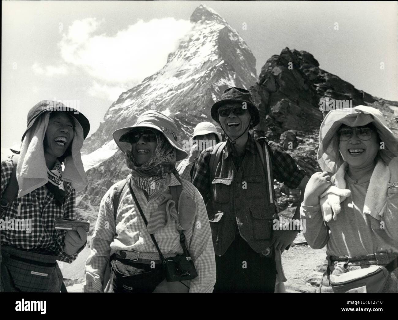 Jul. 07, 1990 - Jubilation of 125 years since first ascent of Matterhorn: Tourists from Japan are seen at the Matterhorn all over the year, also at the day of jubilation. Stock Photo