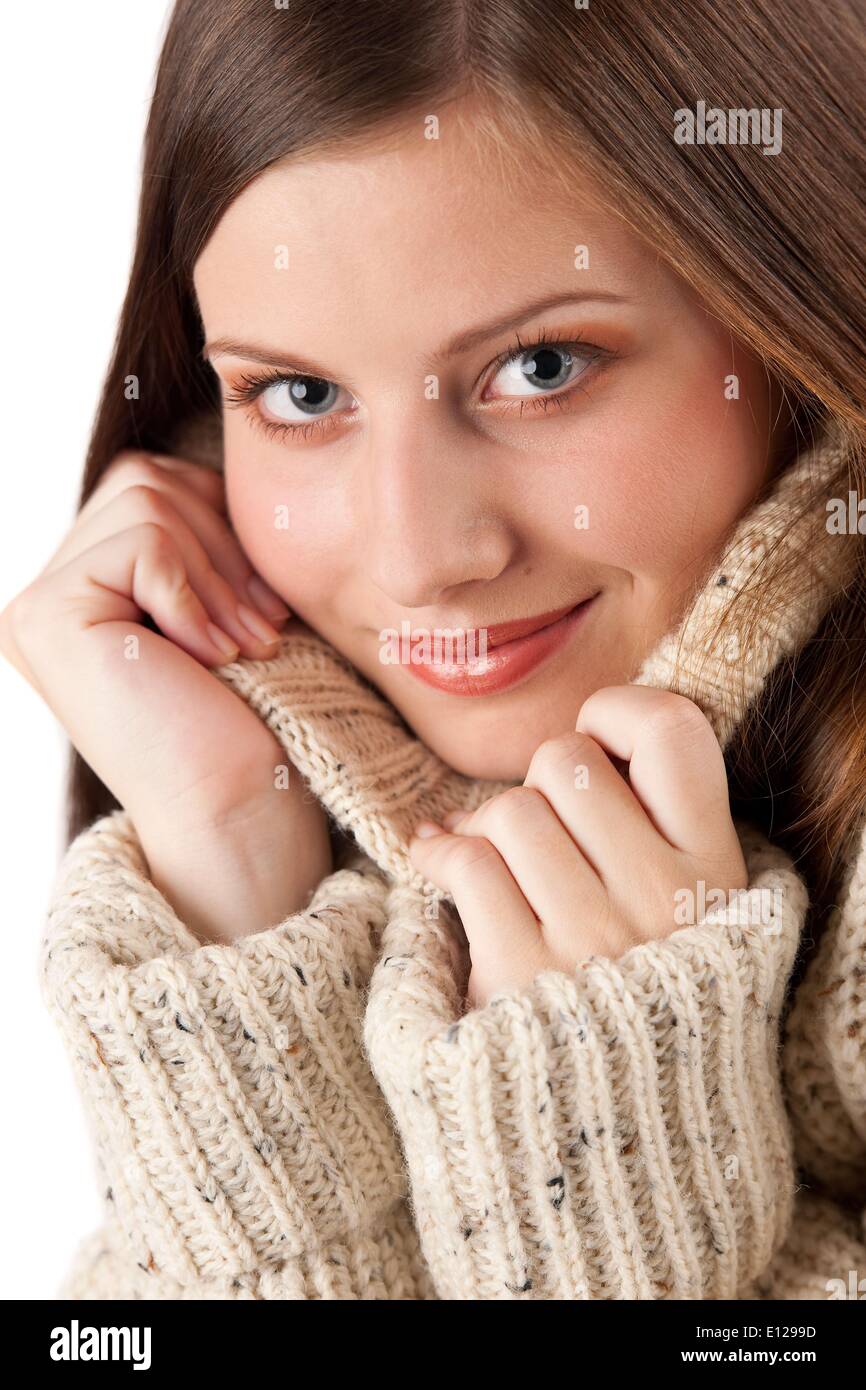 Oct. 29, 2009 - Oct. 29, 2009 - Portrait of beautiful young woman wearing turtleneck on white background Stock Photo