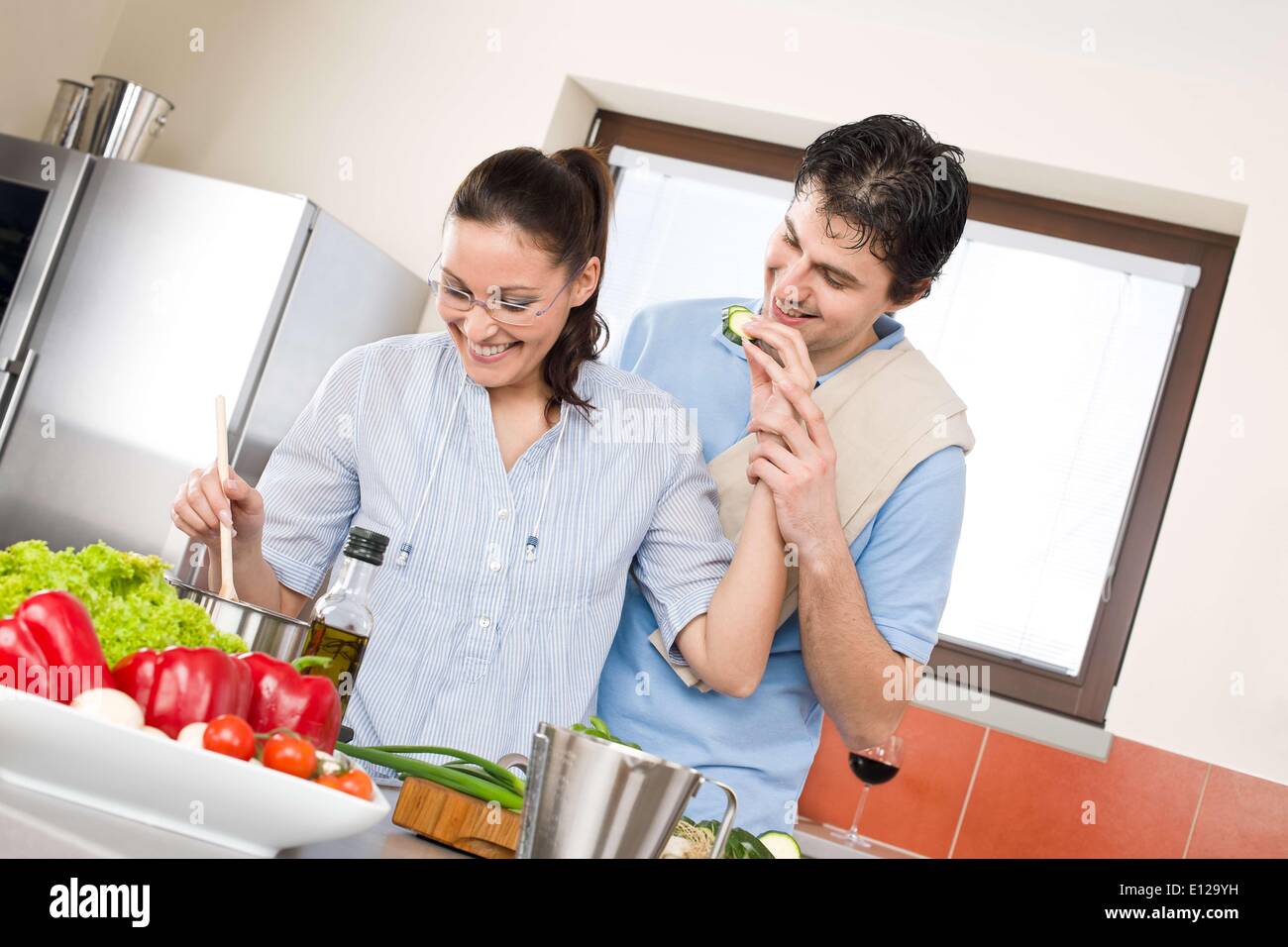 Mar. 30, 2010 - March 30, 2010 - Smiling couple cook in modern kitchen with vegetables Ã‚Â© CTK/ZUMAPR) Stock Photo