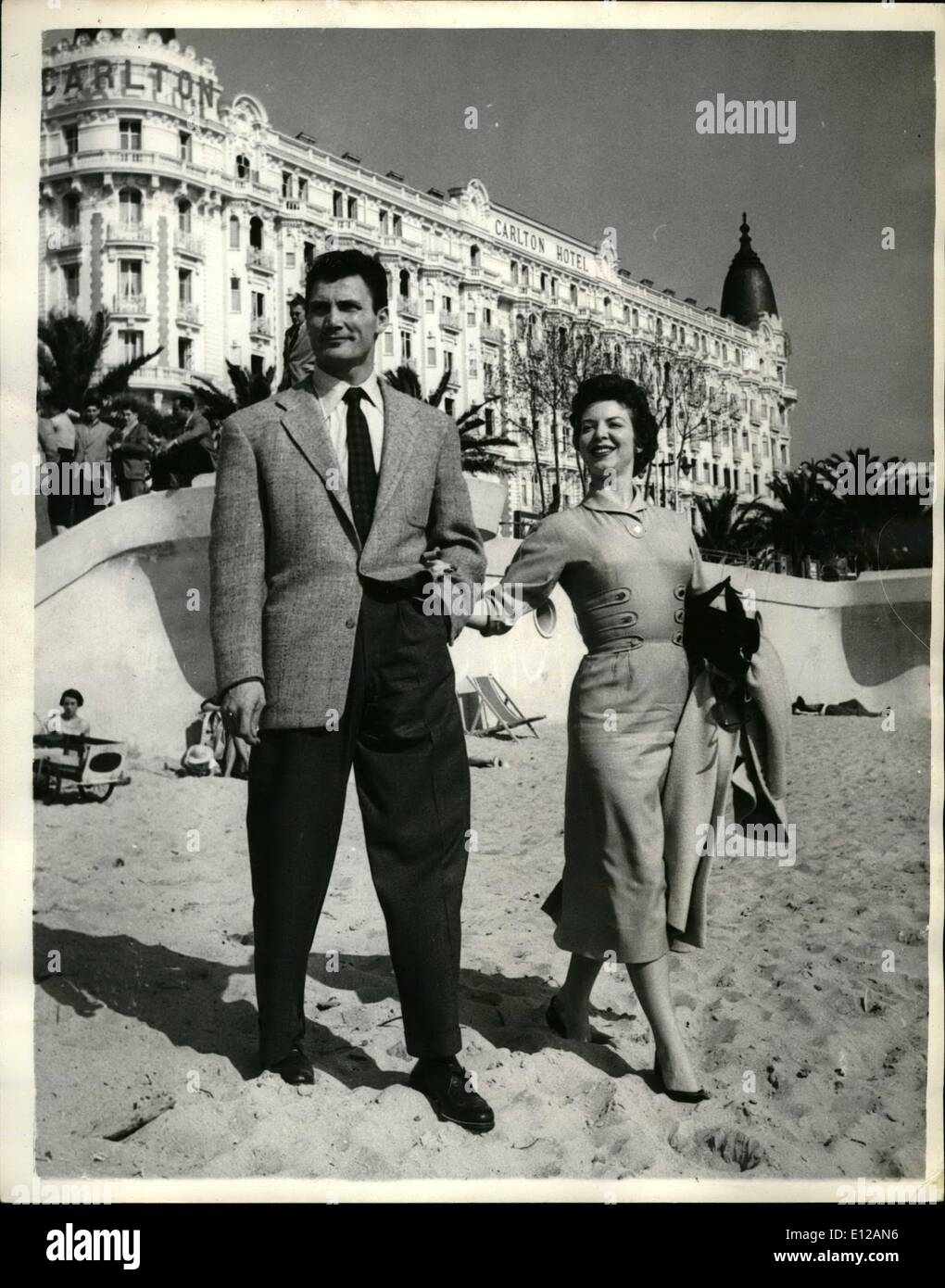 Dec. 09, 2011 - International Film Festival at Cannes. American Tough Guy and his wife. One of the most recent arrivals at Cannes for the International Film Festival was Tough Guy Jack Palance and his wife Virginia Baker a theatrical artist who says she leaves the acting to Jack. Keystone Photo Shows: Jack Palance and his wife on the beach at Cannes. Stock Photo