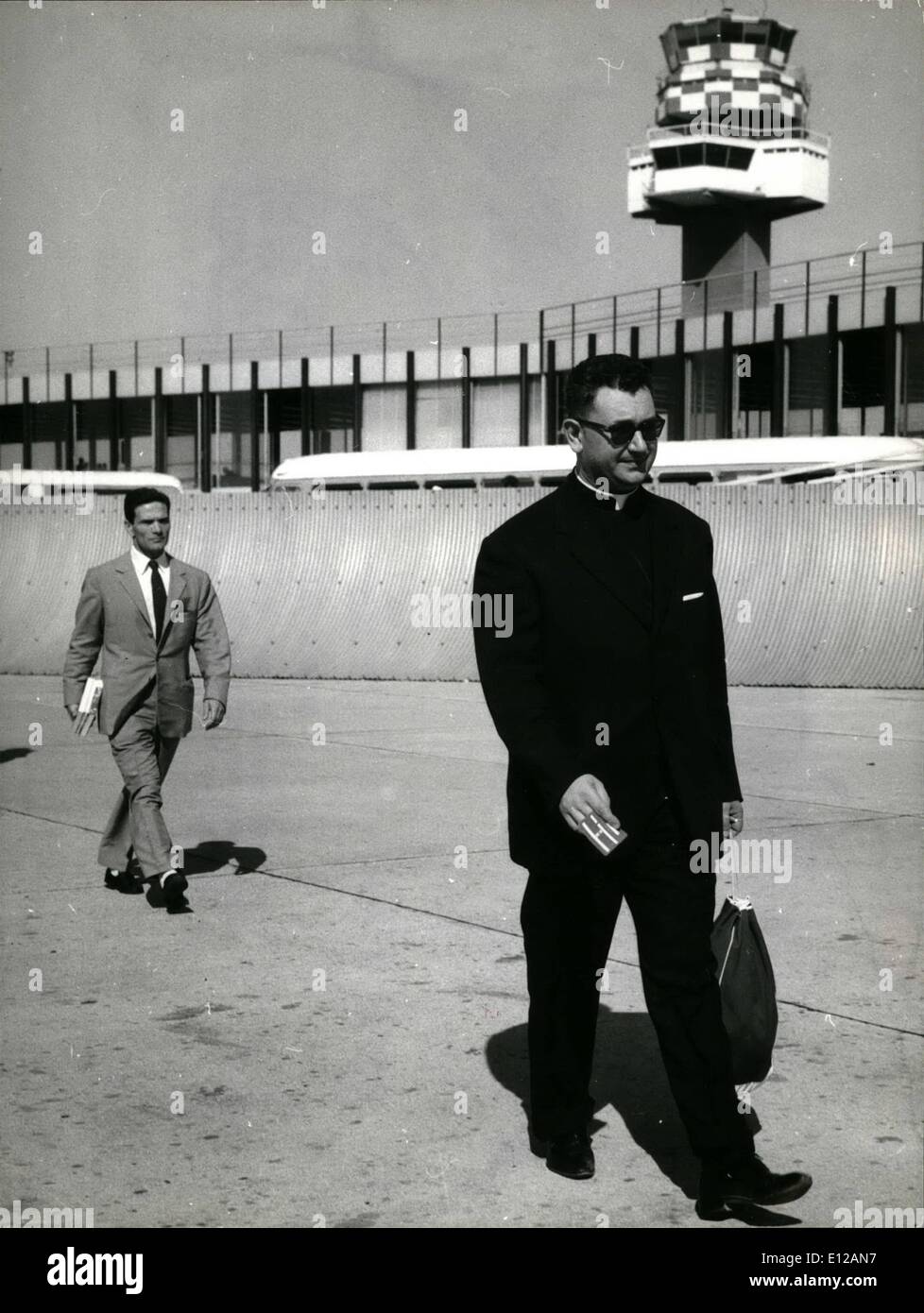 Dec. 09, 2011 - The Italian writer Pier Paolo Pasolini(P.P.P.) left Rome this afternoon for Tel Aviv; the well known writer famous for his communist ideas and rebel to any moral respect-was accompanied by DOn Andrea Carraro a priest who will be the consulting to find the locations for the film Pasolini has in mind to start next month:Il Vangelo'' ( The Gospel' Stock Photo