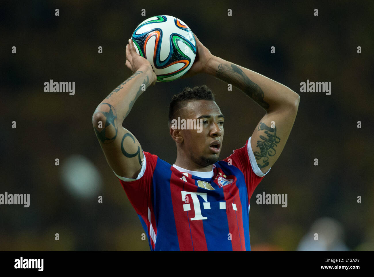 Berlin, Germany. 17th May, 2014. Munich's Jerome Boateng in action during the DFB Cup final between Borussia Dortmund and FC Bayern Munich at the Olympic Stadium in Berlin, Germany, 17 May 2014. Photo: Soeren Stache/dpa/Alamy Live News Stock Photo