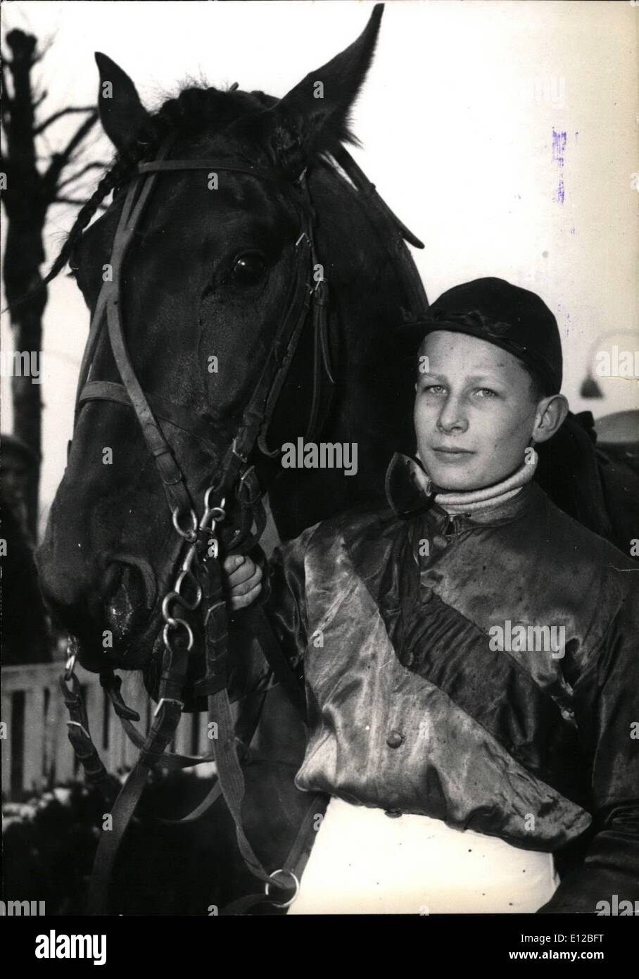Dec. 09, 2011 - Fourteen year old jockey totals 20 victories. At 14, Jean-Pierre Dubois is France's youngest jockey. He already totals twenty victories. He scored his first victory when he was only 12 years old. He is seen here at the Vincennes racecourse. Feb. 18/55 Stock Photo