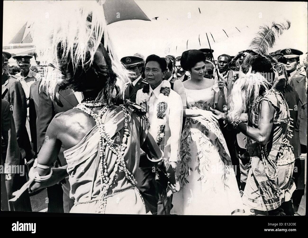 Dec. 16, 2011 - Nairobi: Kenya: President Marcos of the Philippines with his wife Imelda Marcos surrounded by traditional dancers during their visit to Nairobi. Kenya. Stock Photo