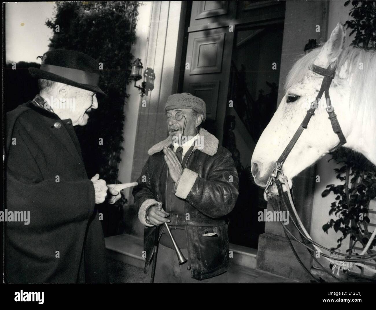 Dec. 16, 2011 - Somerset Maugham celebrates his 91st Birthday: Somerset Maugham celebrated his 91st Birthday in his villa at saint-Jean Ferrat (French Riviera) yesterday. Photo Shows Somerset Maugham pictured with a Friend, the English Author William Holt who came to see him riding a white horse. Stock Photo