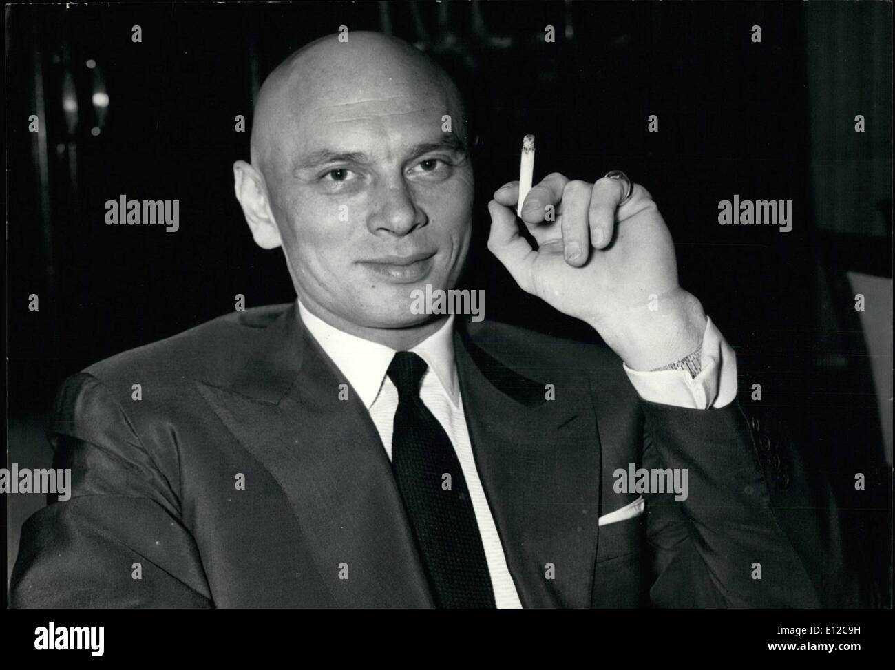 Dec. 16, 2011 - Yul Brynner in Paris. Yul Brynner who is co-starring with Charlton Heston in Cecile De Mille's Ten Commandments is now in Paris. OPS: Yul Brynner during his press conference at the Hotel Plaza Athenee, Paris this afternoon. Feb. 19/58 Stock Photo