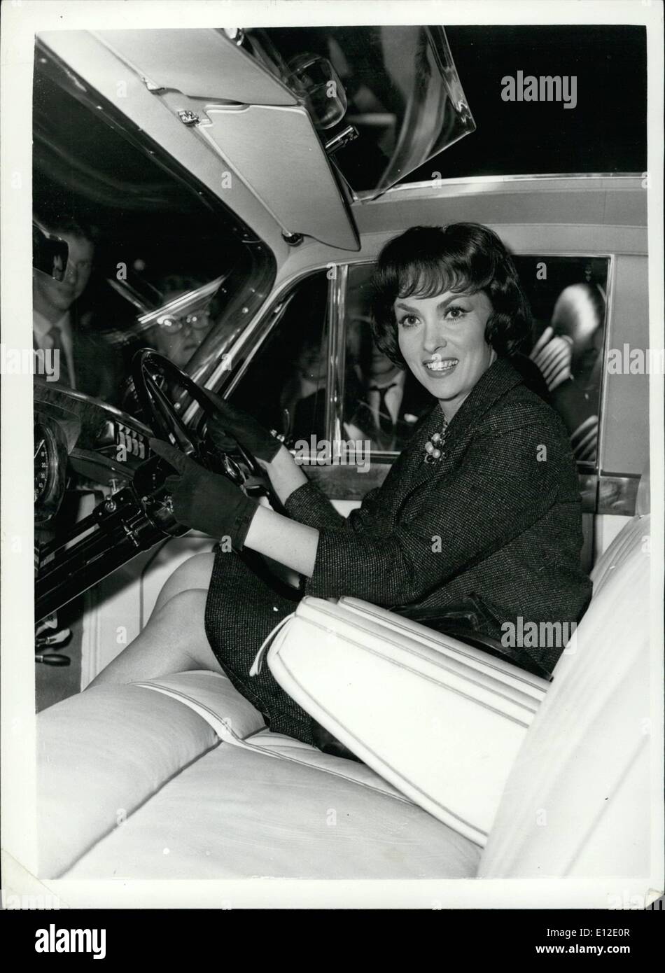Dec. 15, 2011 - Gina Lollobrigida Visits The Motor Show Choose A Rolls: Italian film star Gina Lollobrigida today visited the motor Shows at Earl's Court../.. on the Peter Radford Stand - show saw a replica of the ,000 Rolls Races 'Silver Cloud' which is being presented to her by United Artists for her performance in her film ''Soloman and Sheba''. Photo Shows Gina Lollobrigida seated in the Rolls Royce at the show this afternoon. The film has its premiere tomorrow/ Stock Photo