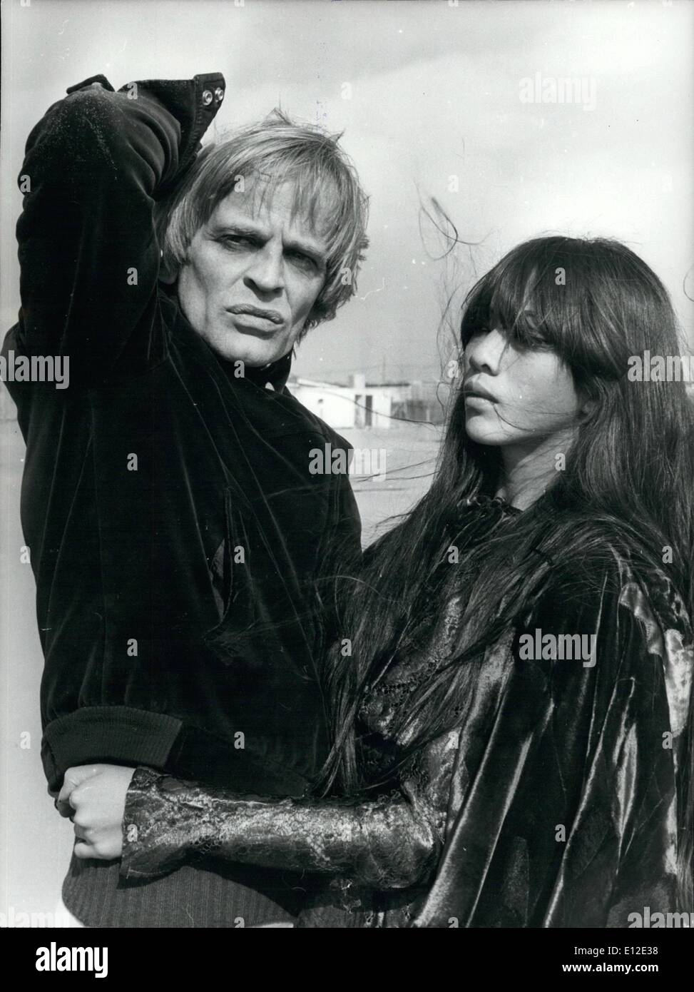 Dec. 20, 2011 - Third Marriage, for the German Actor Klaus Kinski. The Bride is the young Vietnamese Min Hoi, 21, from Saigon. She is daughter of a Vietnamese woman and a French. She has never done of the cinema. Blonde Kalus, who is the good protagonist of many Italian Ã¢â‚¬Ëœwestern' and is well known, after his marriage will play the role of the famous American Writer Edgard Allan Poe. OPS: The two fianc&eacute;es seen at the Fregen Beach. Stock Photo