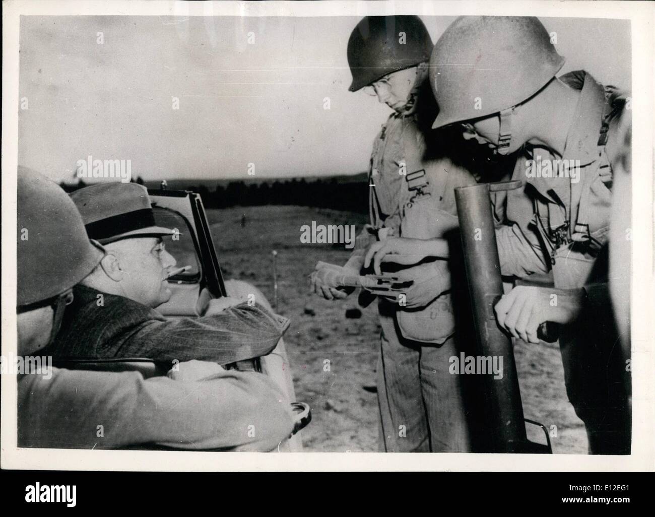 Dec. 16, 2011 - Roosevelt Sees The ''Bazooka'': When Pres. Roosevelt visited Camp Carson in Colorado he witnessed a demonstration of the anti-tank rocket gun nicknamed the ''Bazooka''. He is shown here as Lt. Carl Markell and Capt. George Anthony (L to R) explained its working parts. Stock Photo