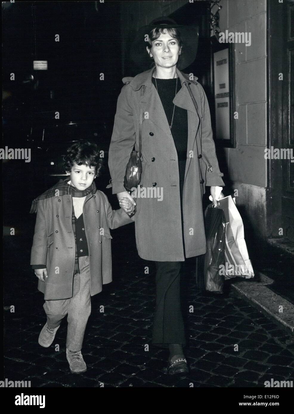 Dec. 21, 2011 - French actress Juliette Myniel, separated friend of Italian actor Vittorio Gassman, seen IN Via Condotti accompanied by her son Alessandro, had during the relation with Gassman. Stock Photo