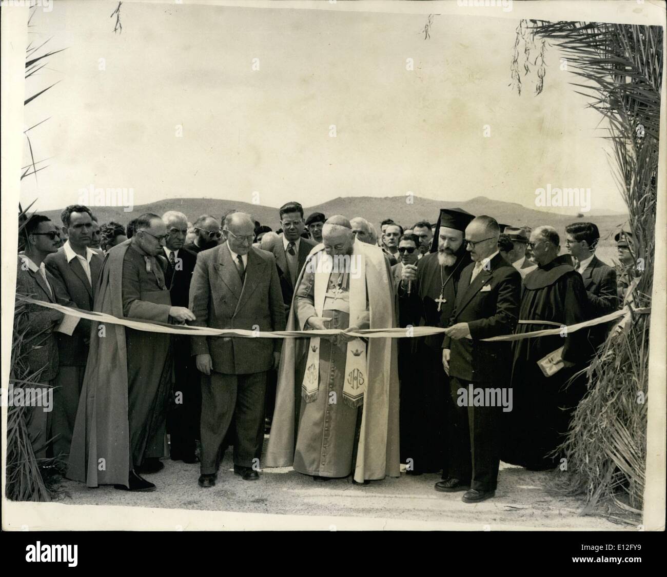 Jan. 09, 2012 - The Latin Patriarch of Palestine opens New road to Holy Places: His Beatitude, the the Latin Patriarch Mons. Alberto Gori recently performed the ceremony of opening the new road which will facilitate visits to the ''Mount of Beatitudes'' (traditional site of the ''sermon of the mountain'') in Galilee - as well as to the famous site of the synagogue of Capetnaum. Mons. Gori travelled from his seat in old city of Jerusalem to attend the ceremony. Photo Shows Cutting the ribbon and opening the new road - by the Latin Patriarch and the Israel Minister of Industry Stock Photo