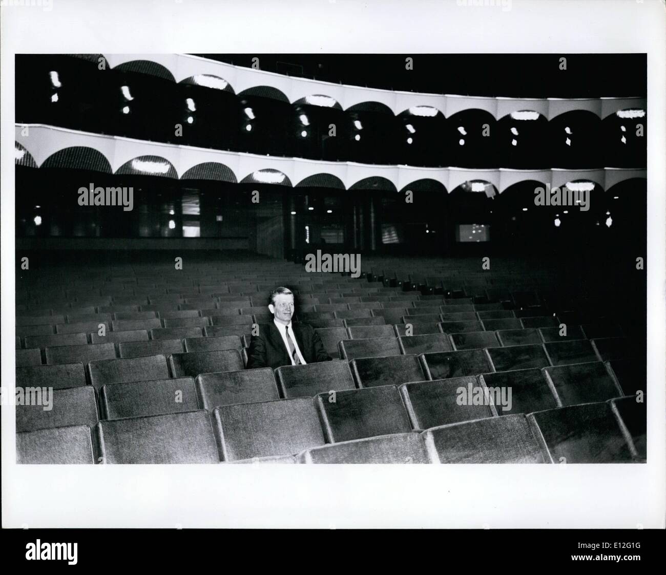 Dec. 26, 2011 - Lincoln Center, NY Mayor John V. Lindsay Sits Alone as the First ''Spectator'' at the New Metriopolitan Opera House as he tries out the seats in the Orchestra. His Comment was ''There is Plebty of leg room' Stock Photo