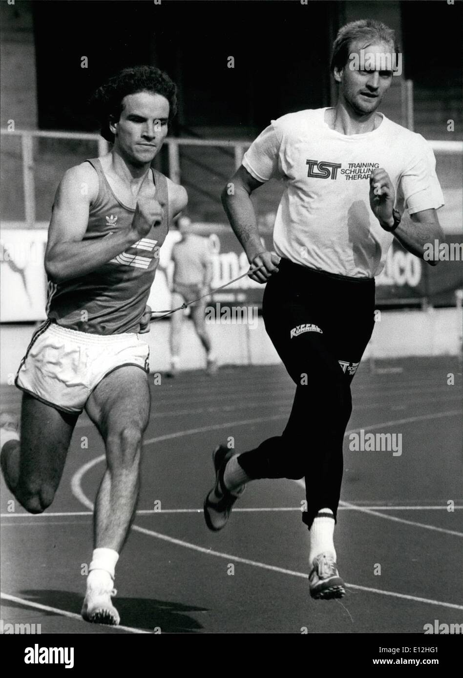 Feb. 24, 2012 - A blind short distance runner. Urs Rehmann may be blind but that does not keep him from participating actively in track and field sports. Picture shows Urs Rehmann (left) lead by his partner Christian Pfander (right) by a leash in the men's 400 meter of an athletic meeing in Zurich, September 10 Stock Photo