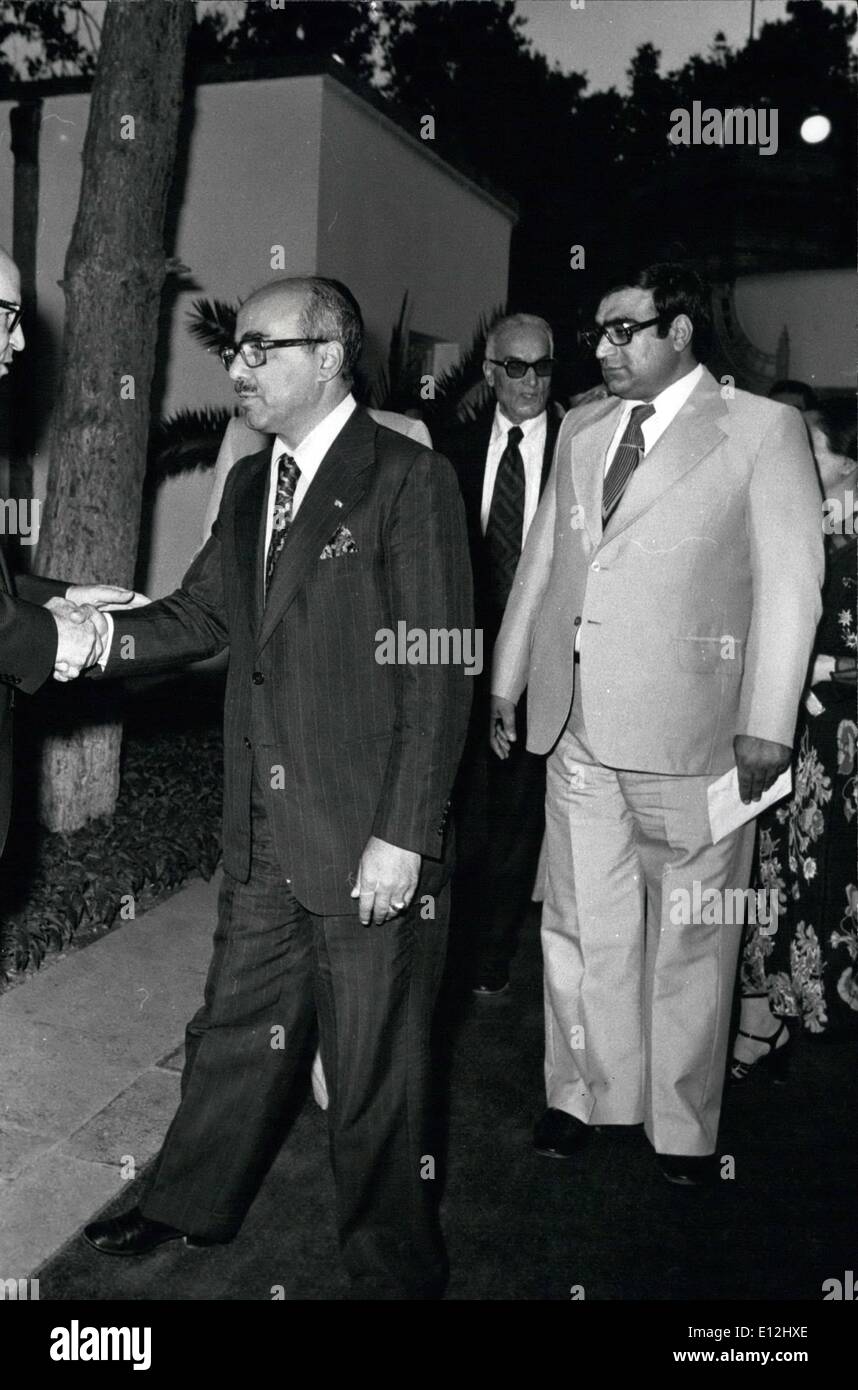 Feb. 24, 2012 - Mansor Rohan, 56 minister of Agriculture and Natural resources since September 1971 Shaif Emani (left) President of the Senate age 67, shaking hands at Senate garden, that night August 4 1977. We Strayed in office old boy. Stock Photo