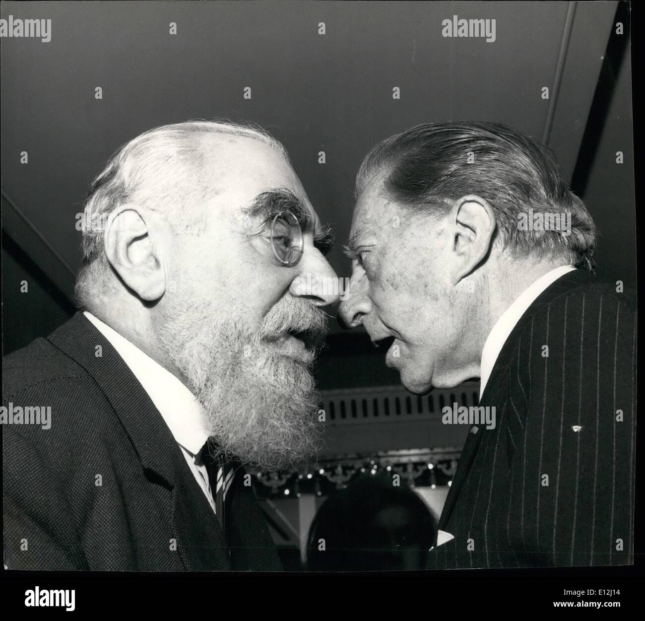 Jan. 09, 2012 - ''How did you make your last Million?'': A nose to nose study of two of the world's richest men - Nubar Gulbenkian (left) and J. Paul Getty, in earnest conversation at a Literary Luncheon in London. Stock Photo