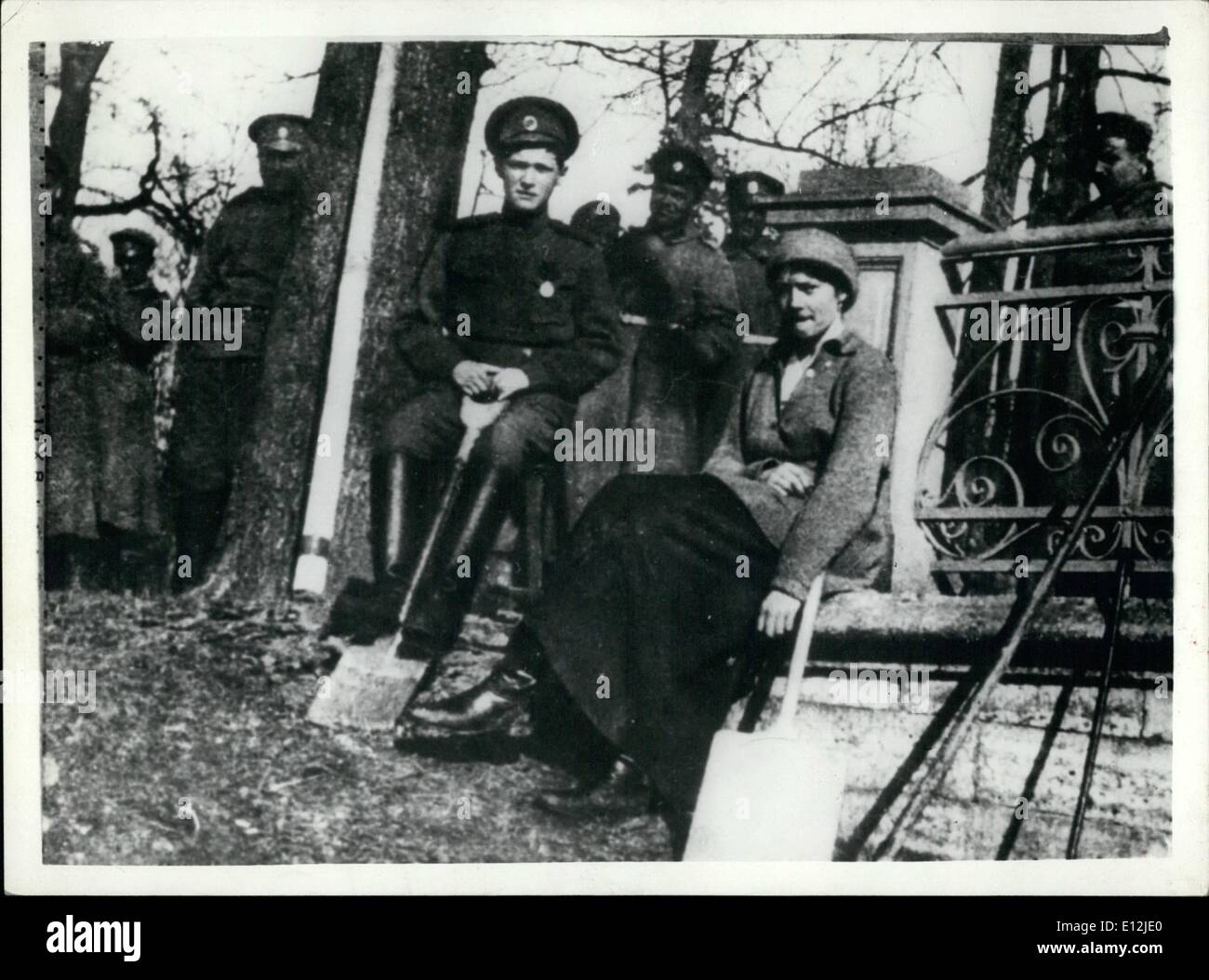 Feb. 24, 2012 - Grand Duchess Olga, during captivity in Ekaterineburg, surrounded by Bolshevik soldiers. to Stock Photo