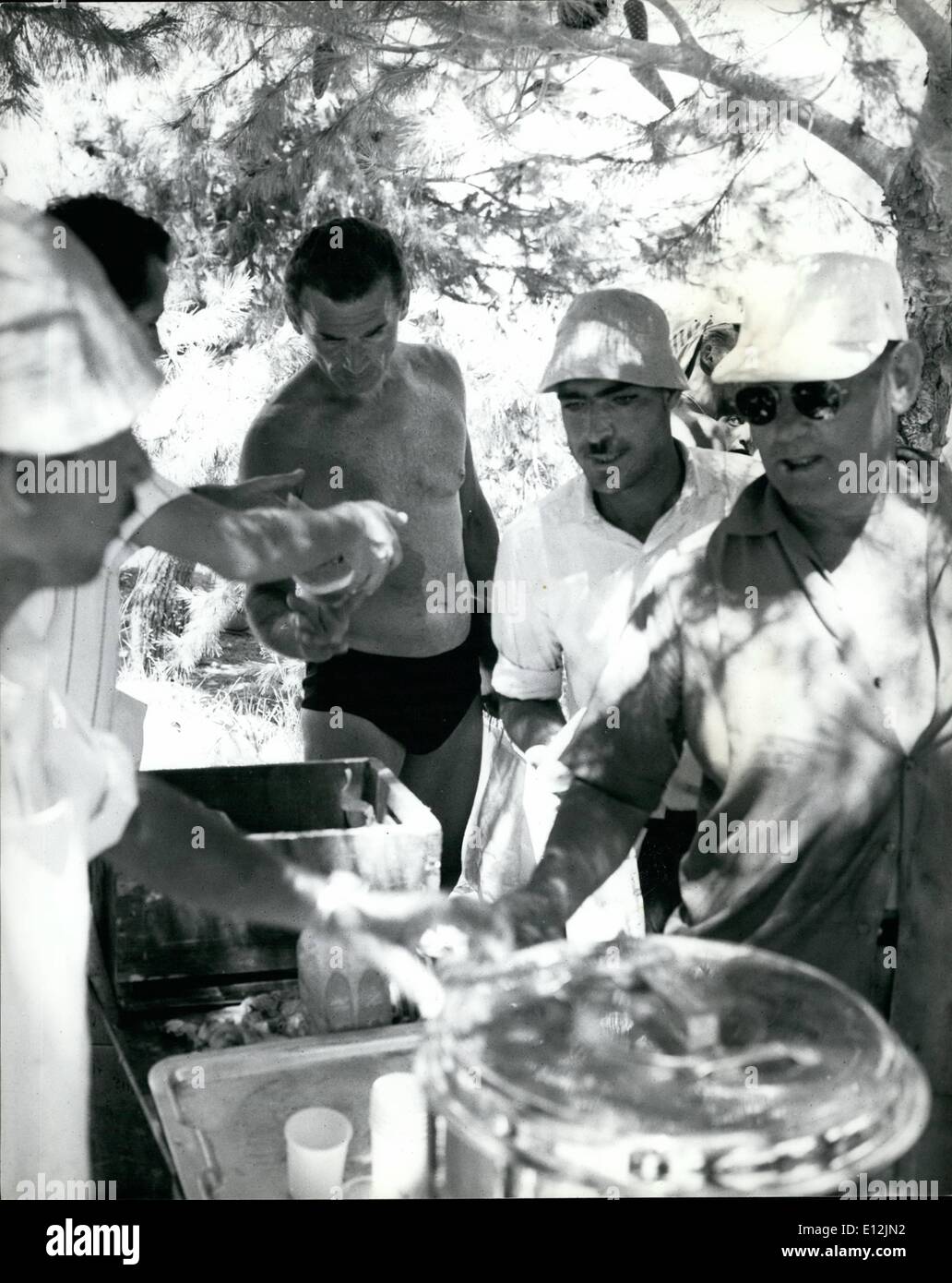 Feb. 24, 2012 - Lunch is served and star Jeff Chandler waits his turn like everyone else. the place is Eshtaol. Stock Photo