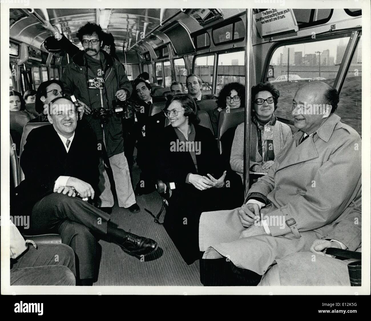 Feb. 24, 2012 - Sunday, Jan. 1st, 1978, New York City After the swearing-in ceremonies of Mayor Edward I. Koch, City Council President Carol Bellamy and Comptroller Harrison J. Goldin, the newly elected officials traveled to the five borough receptions in the press bus. Left to right: Comptroller Harrison J. Goldin, City Council President Carol Bellamy and Mayor Edward I. Koch. Stock Photo