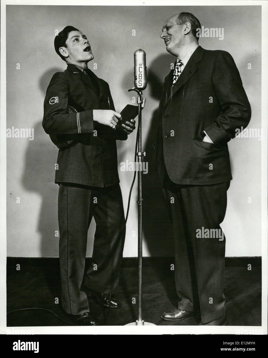 Feb. 24, 2012 - Western Union singing messenger Arthur Buckley and Gabriel Heatter on We The People WABC 9 p.m. January 14, 1941 Stock Photo