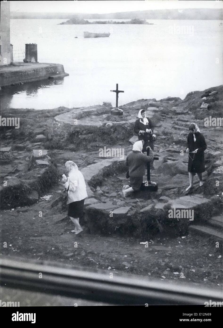 Feb. 24, 2012 - No idle holiday island this; here visitors - seen walking barefoot knee and fast for three days.Photo shows a penitant kneeling among the sharp stones of what was once a monk's cell. Stock Photo