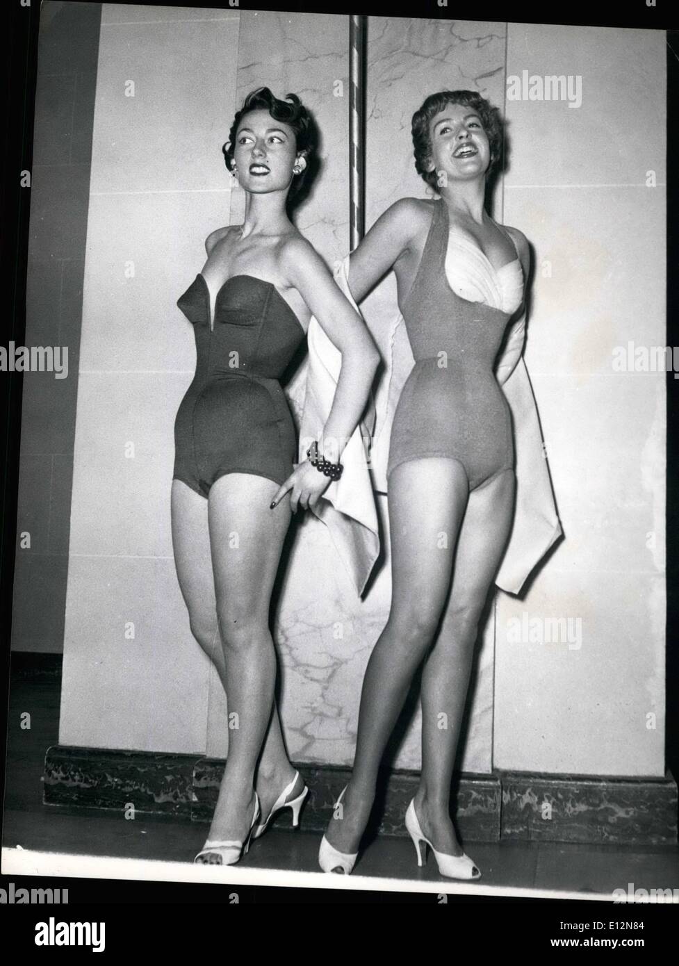Feb. 24, 2012 - Paris Styles For 1953 Swim Season: Two charming styles for 1953 seen at Paris fashion show. On left strapless suit with plunge neckline. On right one piece suit with bodice filled in swathed white jersey. Stock Photo