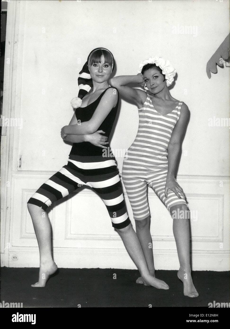 Feb. 24, 2012 - Early Century Beach Fashions Is Jacques Esterel's Idea For Summer 1965: Photo shows. Jacques Esterel, the famous Paris dressmaker, has designed these beach suits reminiscent of the, Belie Edoque as part of his summer collection 1965. Stock Photo