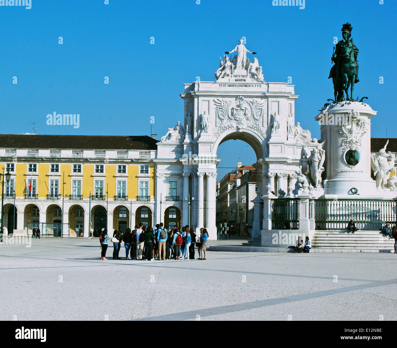 Group of young tourists in elegant Praca do Comercio Lisbon Portugal western Europe Stock Photo