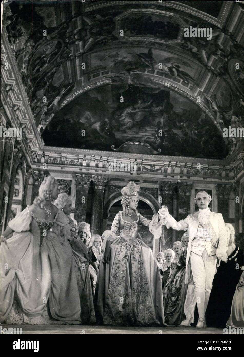 Feb. 24, 2012 - Sacha Guitry revives Versailles history. A scene of the new film produced by Sacha Guitry evoking the glorious history of Versailles. Louis XVI (Gilbert Boka) and Marie Antoinette (Lama Marconi) are seen here in the gorgeous surroundings of the hall mirrors. July 20/53 Stock Photo