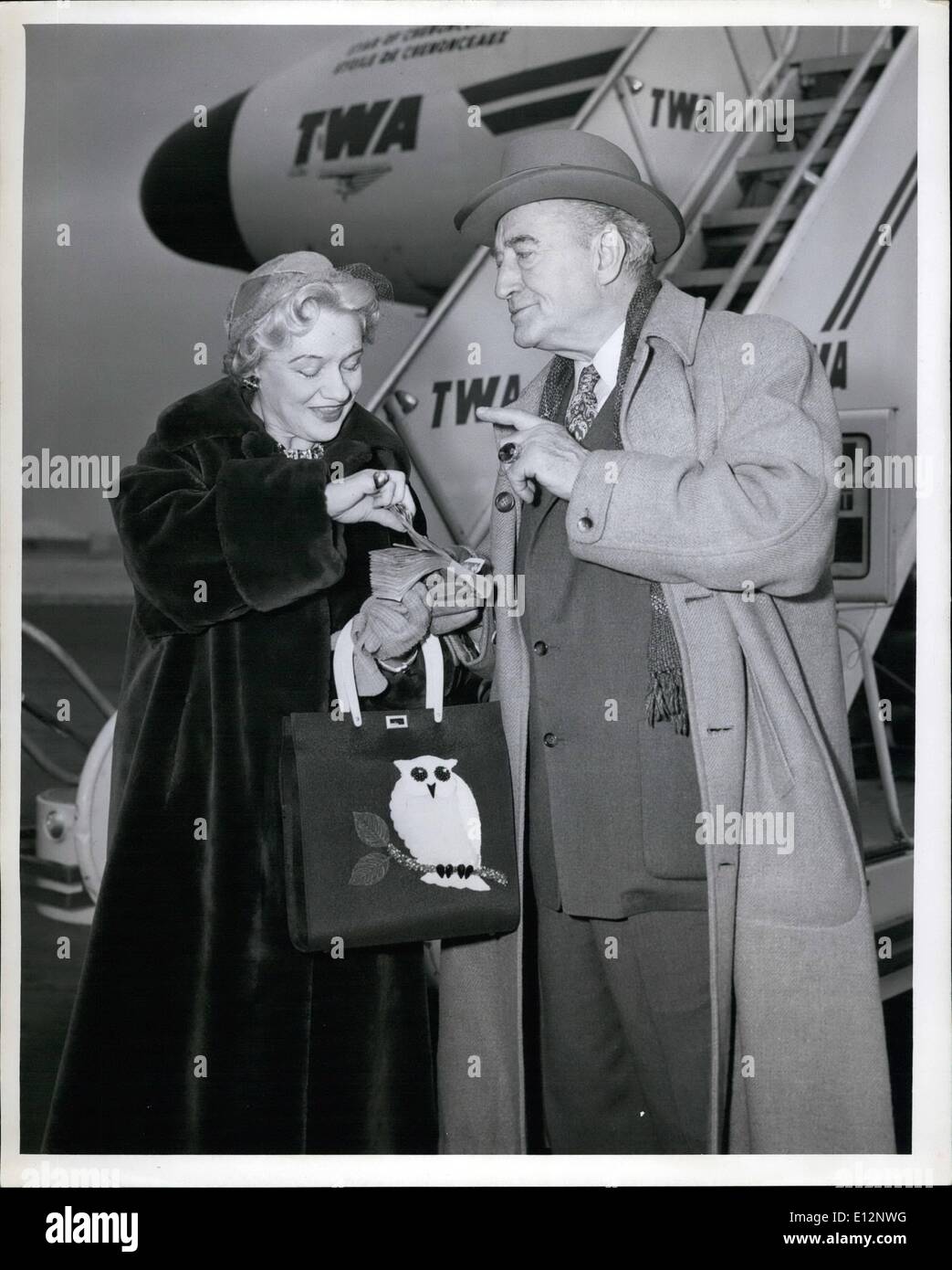 Feb. 24, 2012 - Francis X Bushman, silent screen star, and his wife Iva are shown as they a TWA flight here today for their here in Los Angeles. Mr. Bushman won Thirty thousand Dollars on a TV quiz show. Stock Photo