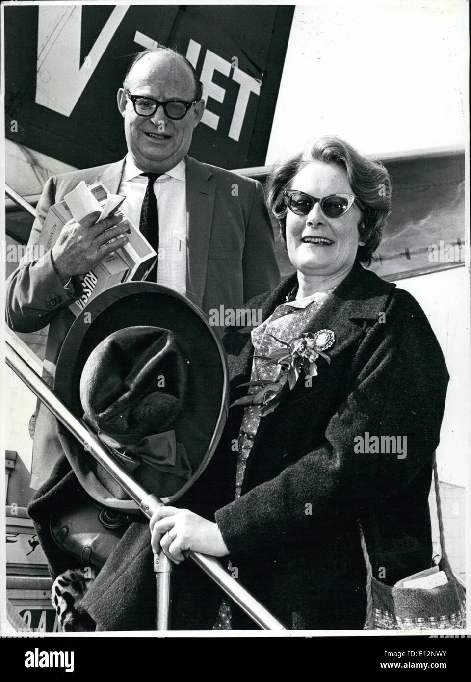 Feb. 24, 2012 - Mr. and Mrs. Russell Drysdale photographed as they left Sydney for the United Kingdom on August 14, 1965. One of Australia's foremost artists Mr. Drysdale to London to hold a one-man exhibition of his work at the Leicester Galleries. On the eve ogf his departure he was awarded the 1965 Brittianica Australia Award for Art with a prize of ,000. Stock Photo