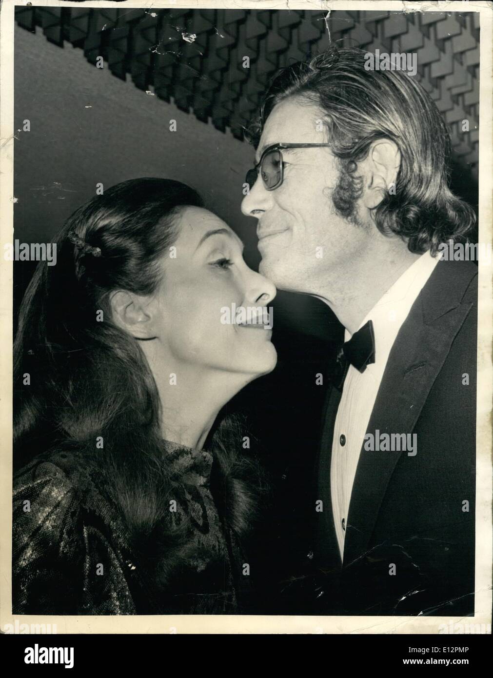 Feb. 24, 2012 - Murphy's War Premiere in London: Actor Peter O'Toole, kisses his wife, actress Sian Phillips During the Royal Charity Premiere of ''Murphy's War'' Held at the Odeon,Leicester Square, London, this evening, January 13. H.R.H. Princess Alexandra attend the Premiere which was held in Ain of the Royal Commonwealth Society for the blind. The film star Peter O'Toole, Sian Phillips French actor Philippe Noiret and Germany's Horst Janson in the Principal roles. Stock Photo