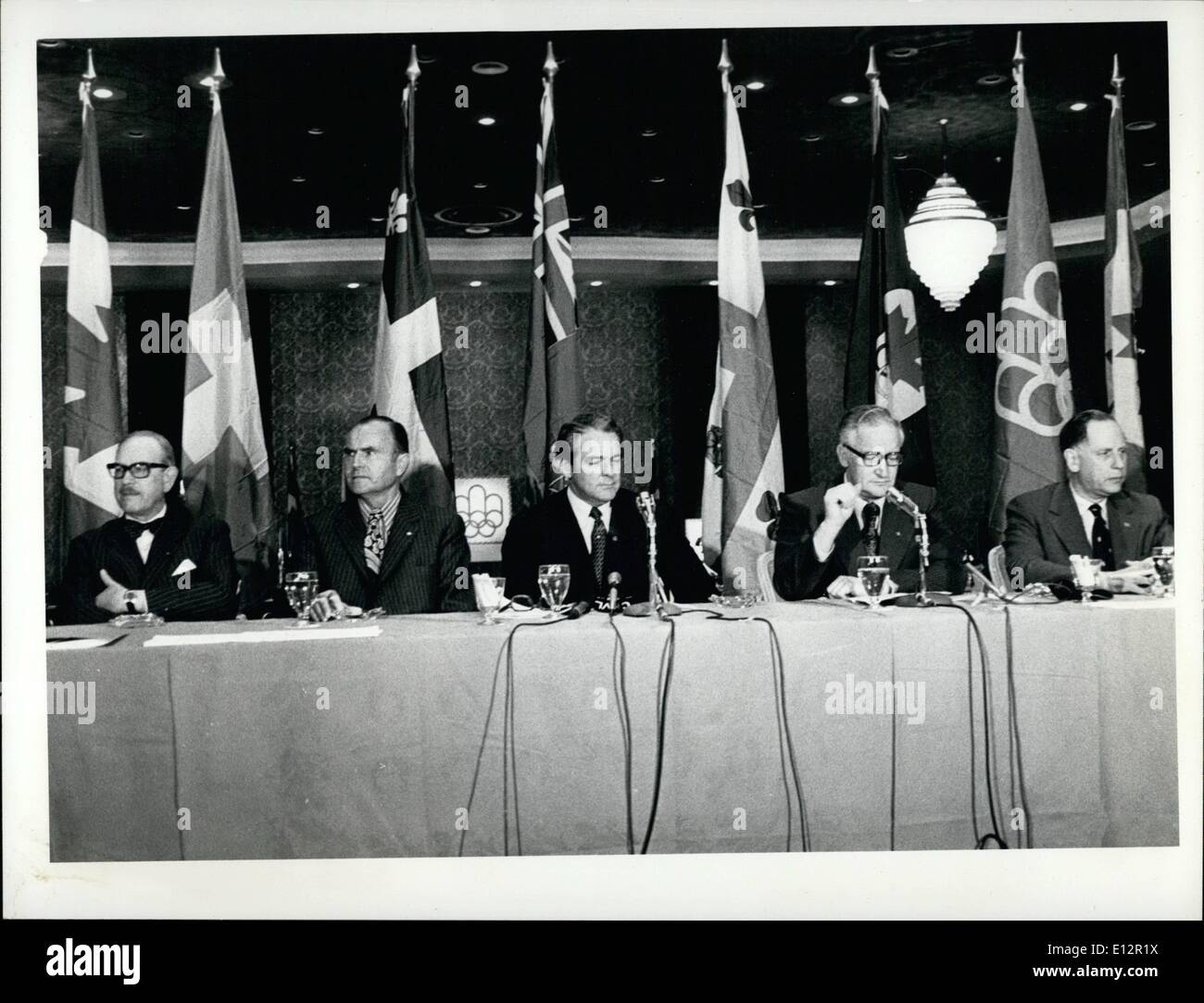 Feb. 24, 2012 - Montreal Olympics - 1976 The Olympics organizing committee has signed a contract with the Swiss Chronometric Society for instrumentation which will clock, measure and generally ''place'' contestants in the Olympic games to be held in Montreal in 1976. the Swiss have donated all the equipment to be used for the events - including a massive computer which alone does the work of sixty. Stock Photo