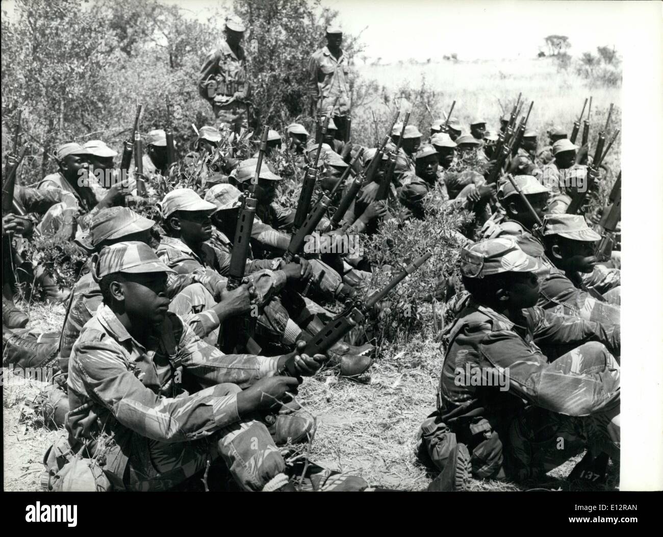 Feb. 24, 2012 - Ian Smith's Black Troops Most of the Rhodesian Armed Forces are black, and it is there men who are bearing the brunt of the war along the frontier with Mozambique. When our photographer asked the troops, why they joined some said that their relatives had been killed by the nationalist guerillas and wanted revenge, but most admitted it was simply a matter of money. Photo Shows: Men of the Rhodesian African Rifles seen in training near Balawayo. Stock Photo