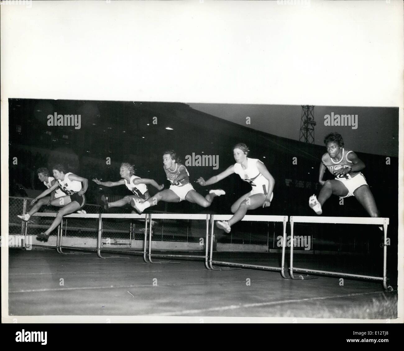 Feb. 24, 2012 - Britain Wins. London: First hurdle during the Women's 80 metres hurdles in the Britain and Commonwealth versus U.S.A. games at the White City Stadium here tonight. Britain's Carol Quinton won, with Mary Bignal, also of Britain second. 14th September, 1960 Stock Photo
