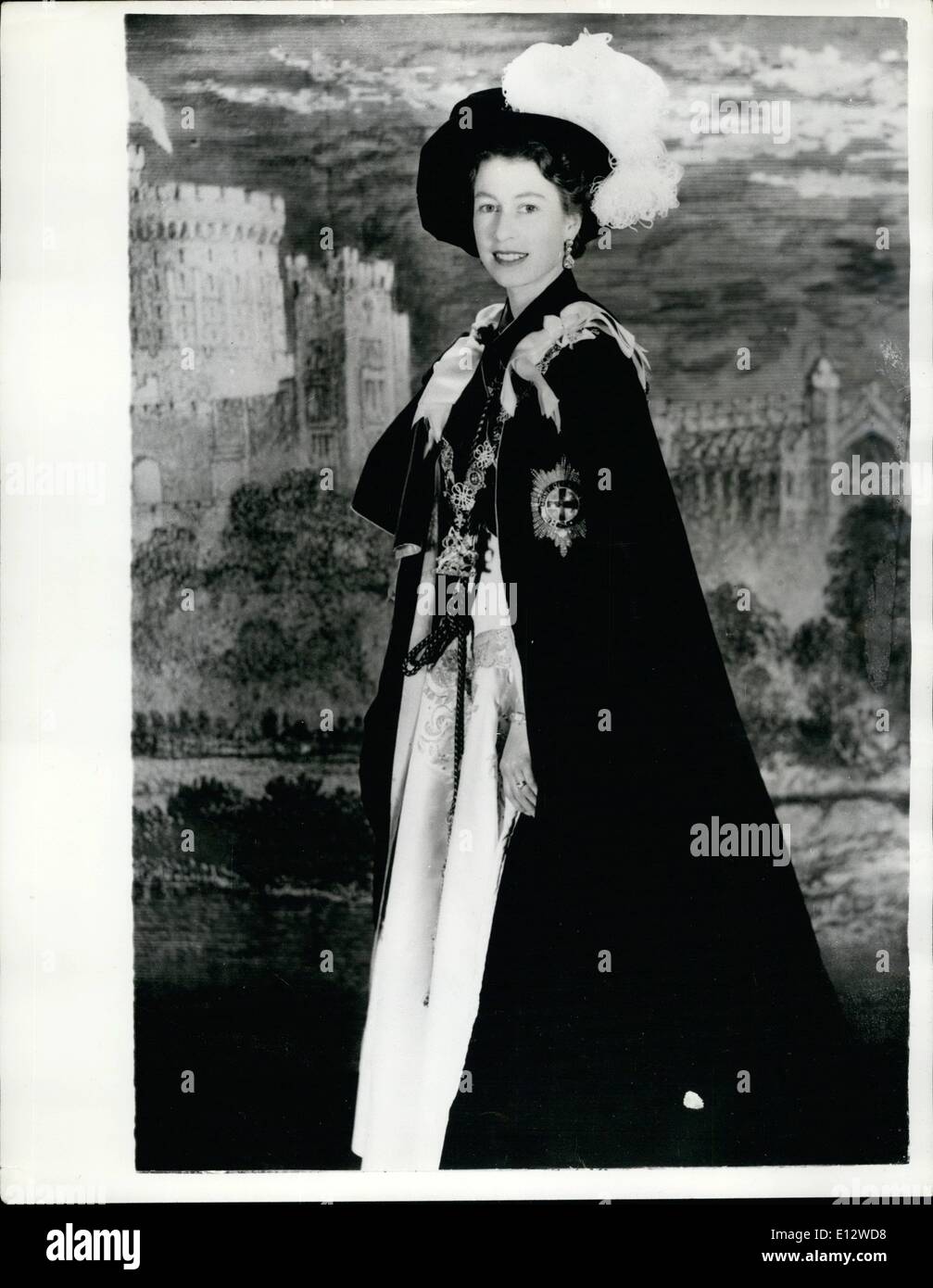Feb. 26, 2012 - Garter Sovereign. This photo of Queen Elizabeth was made by Cecil Beaton at Buckingham Palace especially in connection with the Garter Ceremony to be held at St. George's Chapel, Windsor Castle. At the ceremony Sir Anthony Eden, Earl Attlee and the Earl of Iveagh are to be invested. This will bring the membership of the Order up to 25 and no one else can be accepted into the Order until the death of one of the present holders. The Queen, Sovereign of the Order, most exalted of Britain's Orders of Chivalry, is shown in the habit and signs of the Order Stock Photo