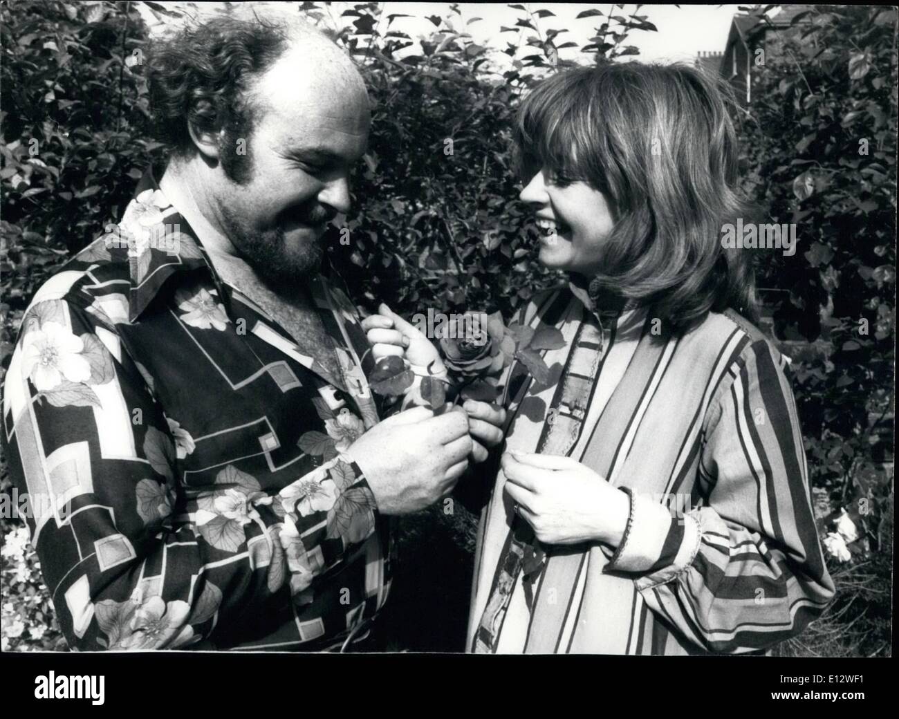 Feb. 25, 2012 - Timothy West and his actress wife Prunella Scales or 'Pooh' as he calls her, in the garden of their Wandsworth Common home, London. Stock Photo