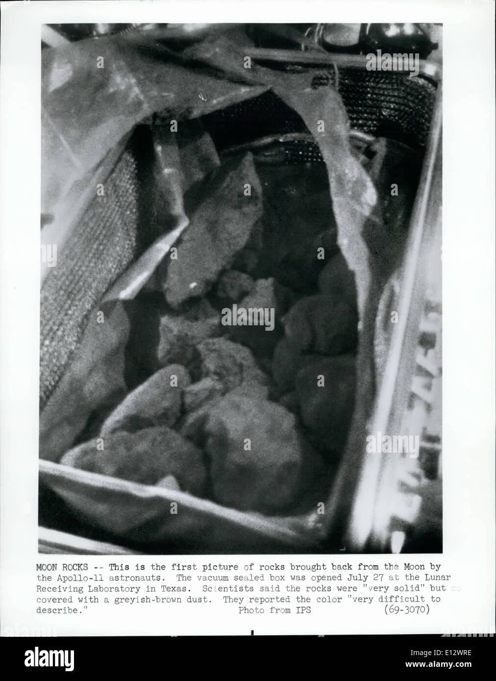 Feb. 26, 2012 - This is the first picture of rock brought back from the Moon by the Apollo-II astronauts. The vacuum scaled box Stock Photo