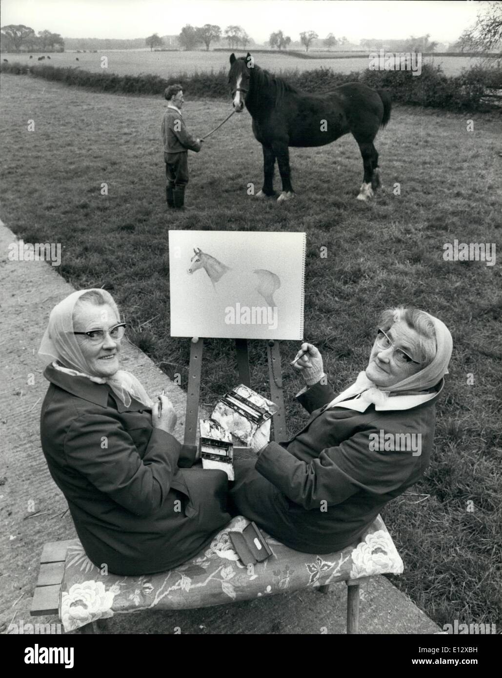 Feb. 26, 2012 - Three horse powered family effort. Tom Alderson holds Blossom steddy for his sisters Mrs Dorothy Margaret and Miss Elizabeth Mary to paint. Stock Photo