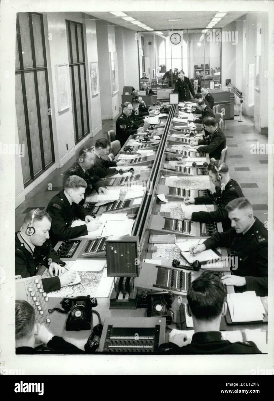 Feb. 25, 2012 - Nerve Centre: In the background telephone operators deal with enquiries, urgent or otherwise; logists and results;in the foreground, operators in communication with squad cars and other stations. Stock Photo