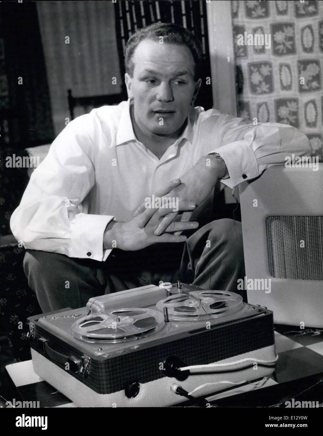 Feb. 26, 2012 - Henry Cooper likes listening frequently to the tape recording made by his mother, of the fights he has taken part in. Stock Photo