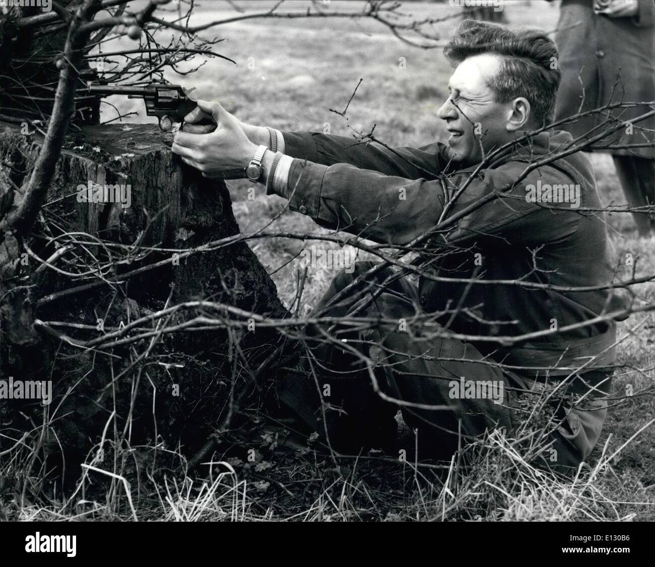 Feb. 26, 2012 - C Cheston of R Division fires from the shelter of the bushes. ESS.c Stock Photo