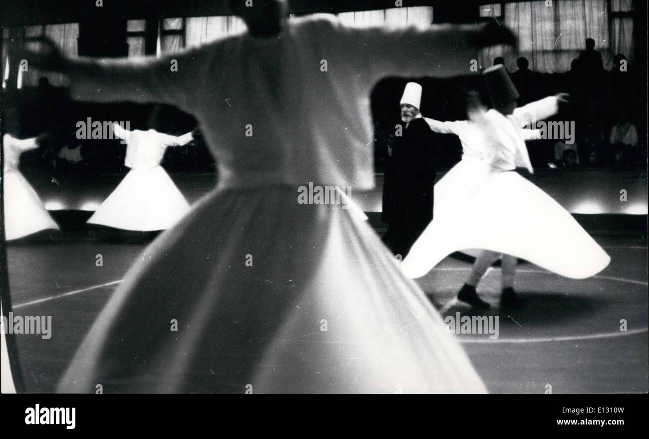 Feb. 26, 2012 - The Whirling Dervishes: Under watchful eye of their Sheik, the Whirling Dervishes turn on the pivot of one foot, accelerating constantly to the sound of music increasing in tempo and volume, a hypnotic swirling melody of flutes against a background of drums and other instruments. Stock Photo