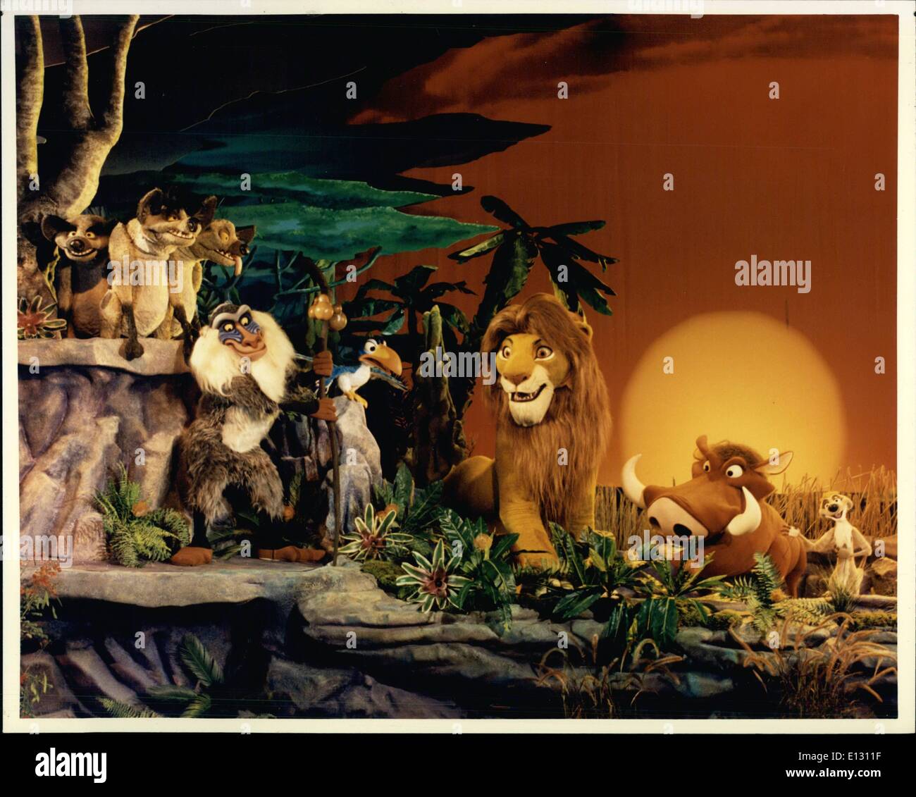 Feb. 26, 2012 - Lion King And His Cast Simba is joined by a host of characters who appear in ''The Legend of the Lion King'' stage show at the Magic Kingdom in the Walt Disney World Resort. The show features music and voices from the film in a three-dimensional extravaganza. Among Simba's supporting characters are Rafiki, the wise baboon; Zazu, a horn-bill and the king's advisor; whacky pals Timon and Pumbaa, a meerkat and warthog; and the nefarious trio of hyenas Shenzi, Banzai and Ed. Stock Photo